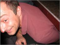 Kevin climbing under the table